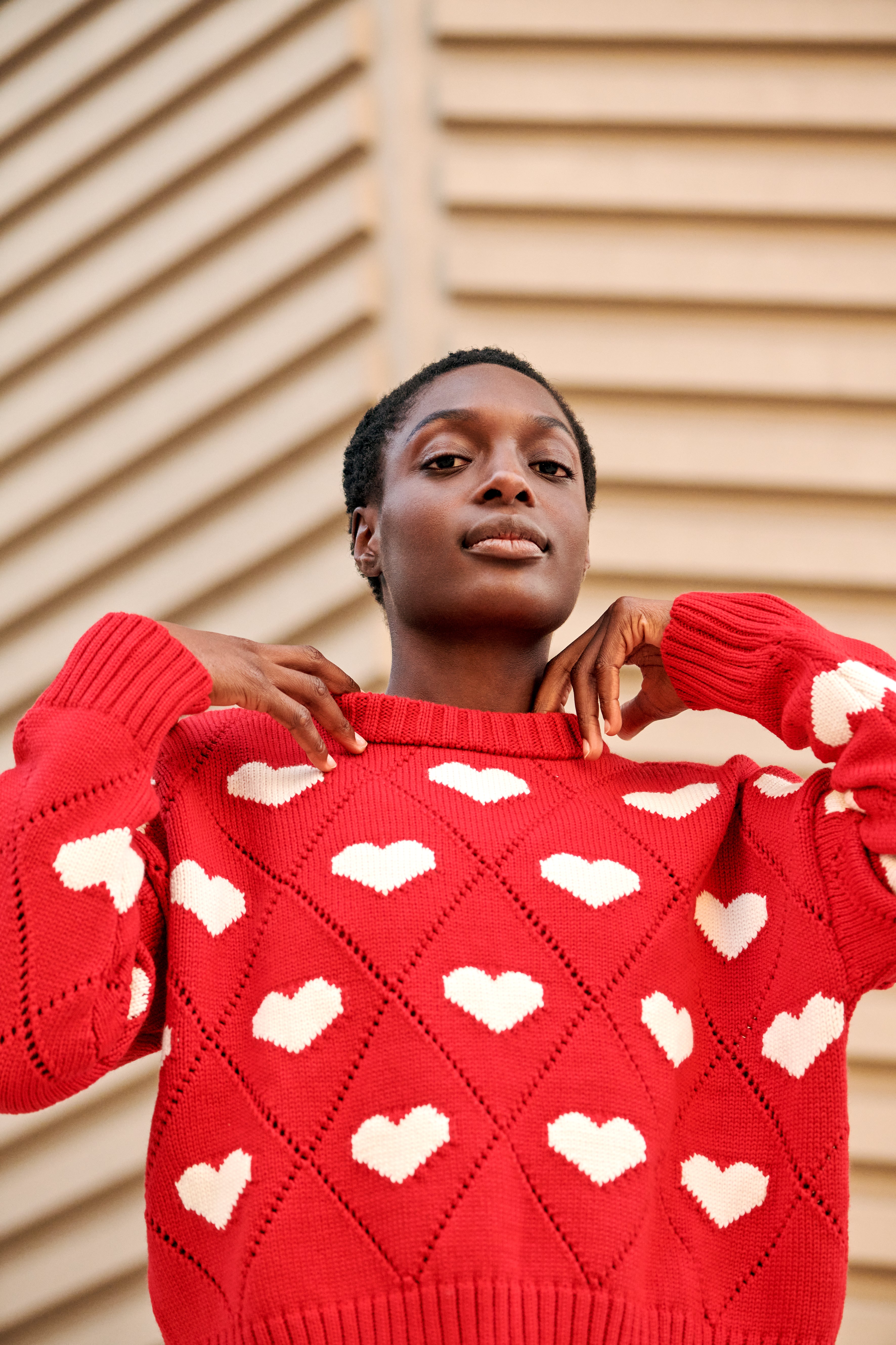 White deals red sweater